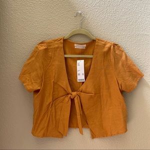 Brand NWT urban outfitters orange tie front top🧡